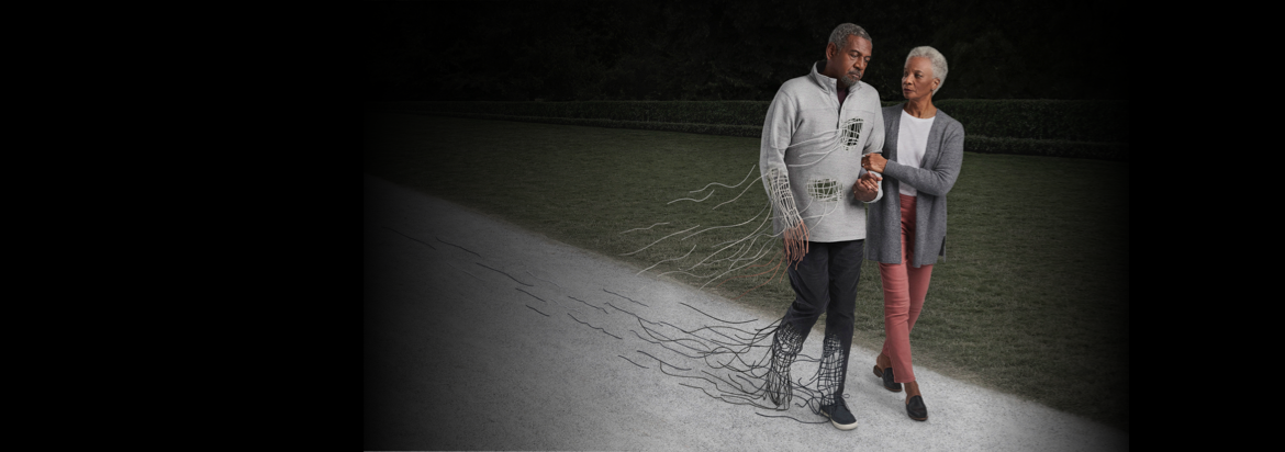hATTR amyloidosis patient unraveling as he walks with his wife in a park